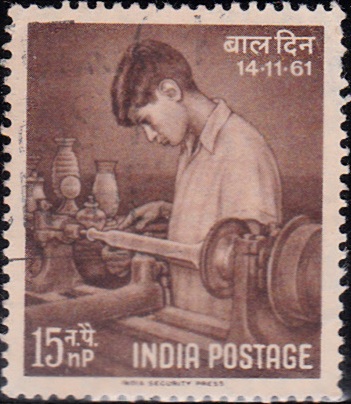 Vocational Training : a boy working at a lathe